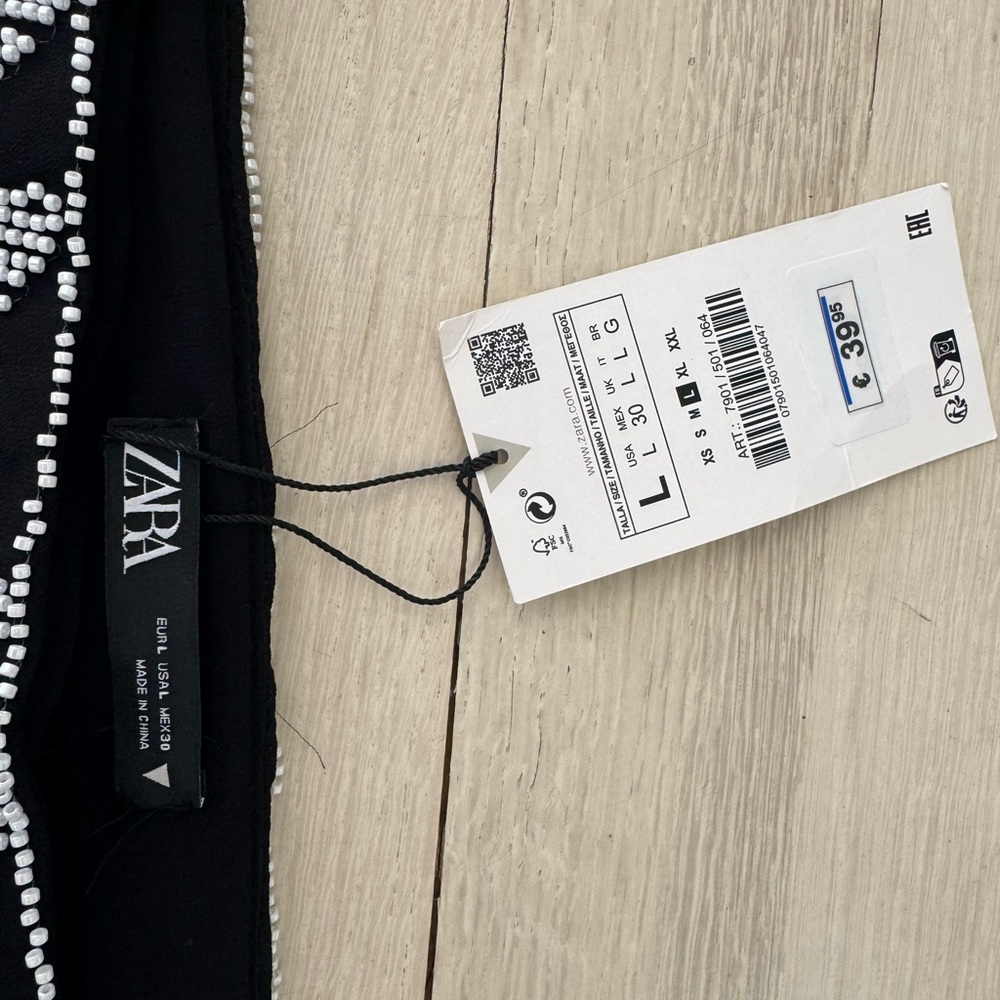 Zara black mini skirt with white beads. Nwt